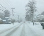 Snow Squall Leads To Slick Conditions