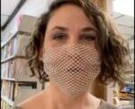 Powell Apologizes For Wearing Mesh Mask