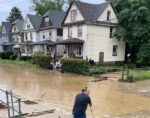 Residents Cleaning Up After Flooding
